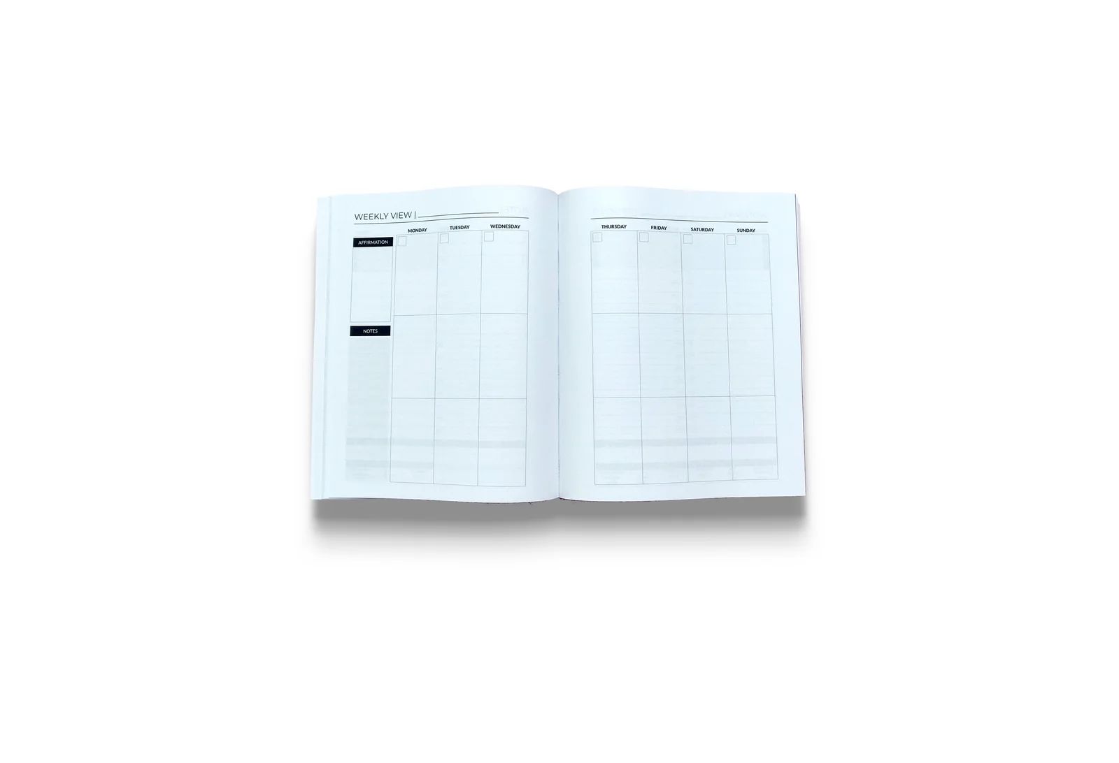 Elefan vertical weekly planner spread with affirmation and notes areas